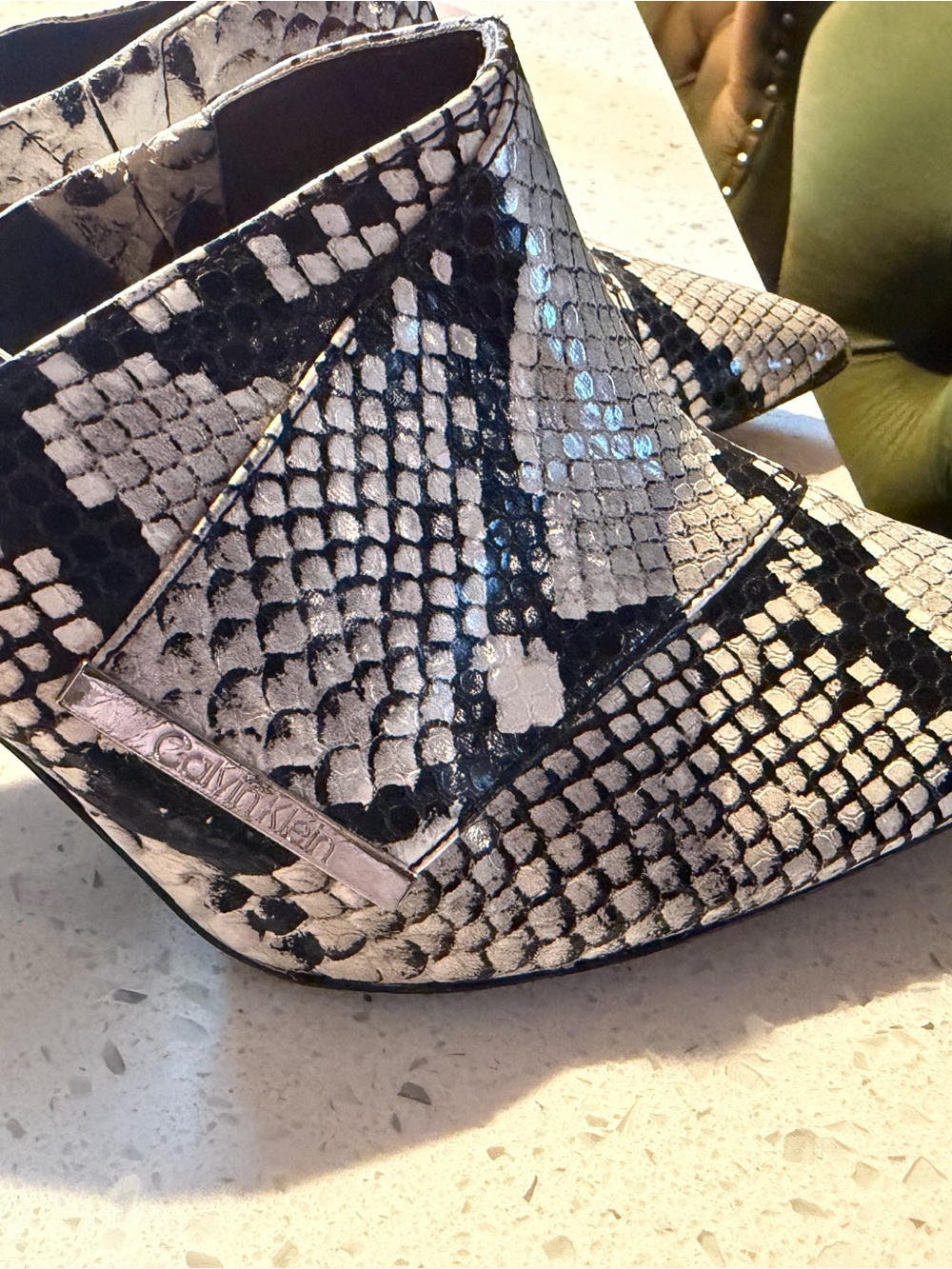 Calvin Klein Snake-Print Pointed Ankle Booties in Black and Cream